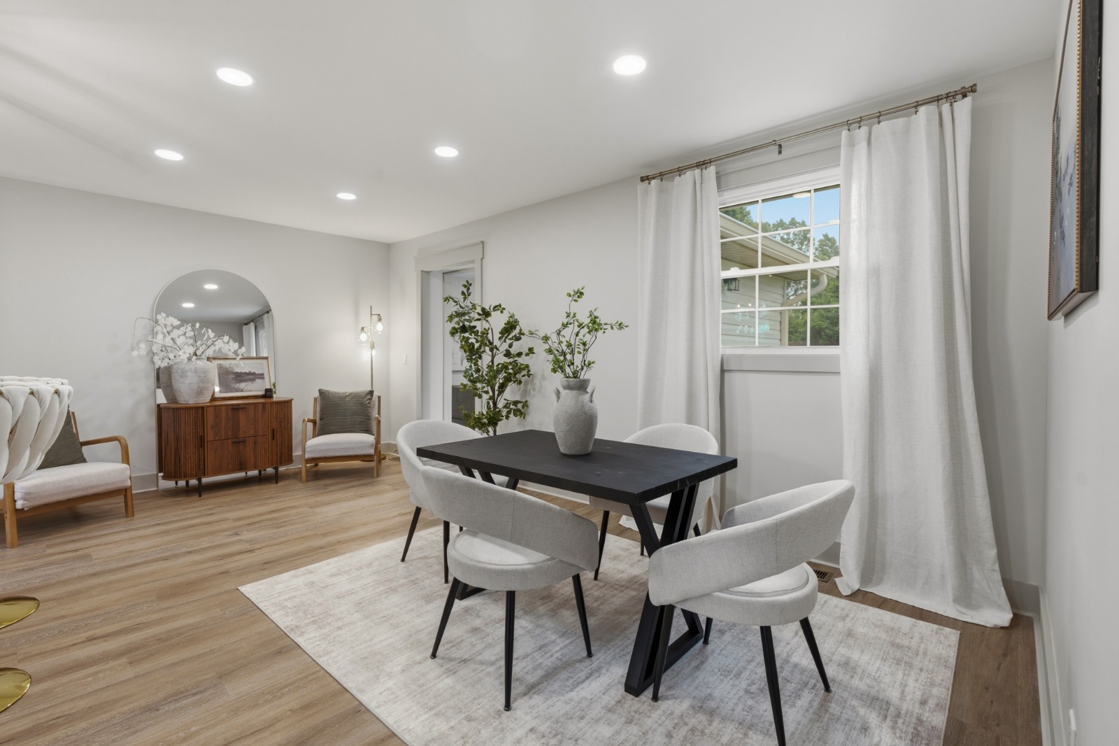 Light-filled dining and living space renovated by Ranger Renovations